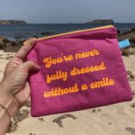 You´re never fully dressed without a smile - Tasche pink mit neon oranger Schrift