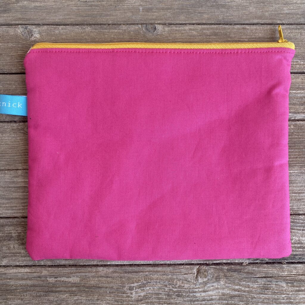 You´re never fully dressed without a smile - Tasche pink mit neonorange Schrift - Rückseite
