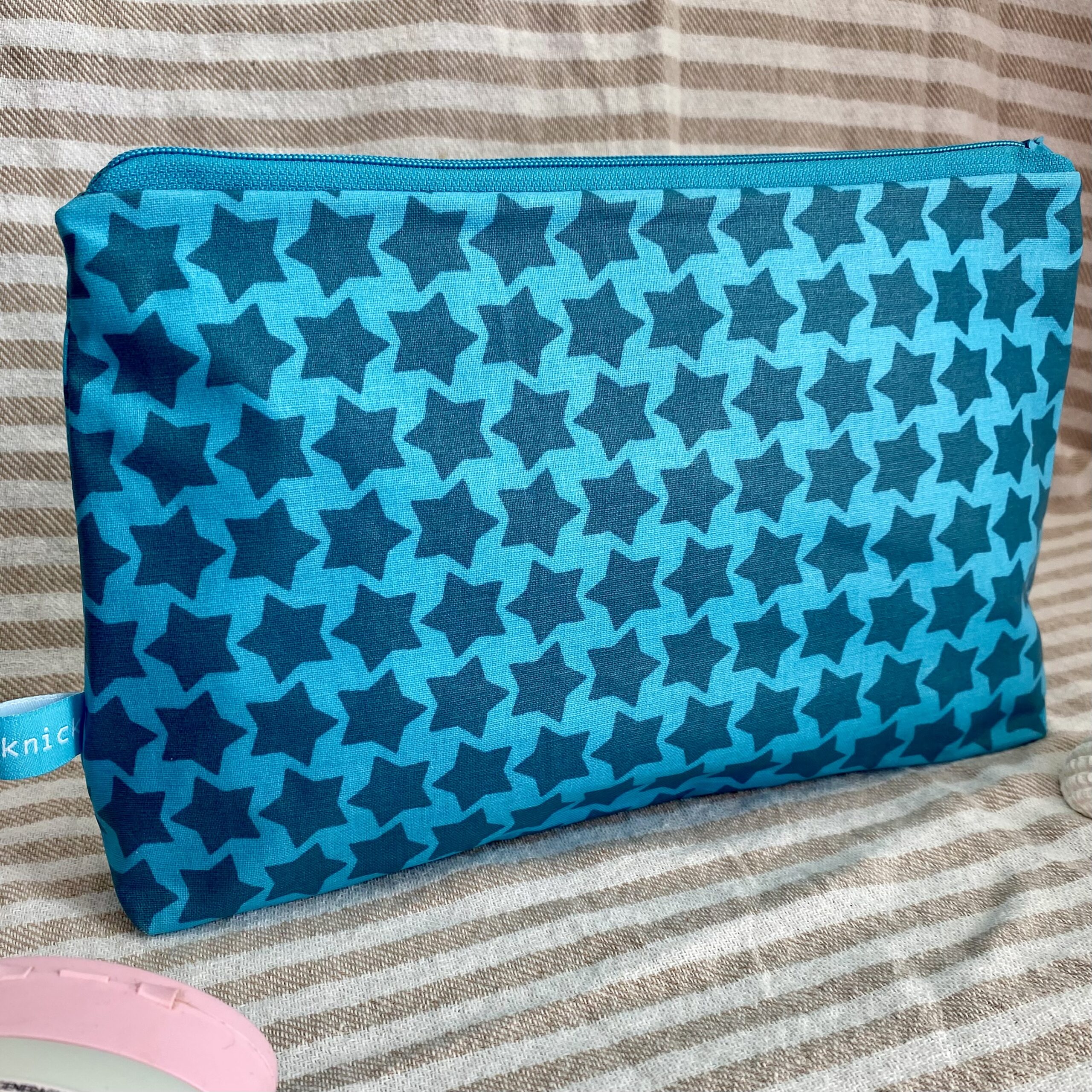 Wetbag, Schwimmtasche, Nasstasche für Strand oder Schwimmbad mit Sternen in türkis