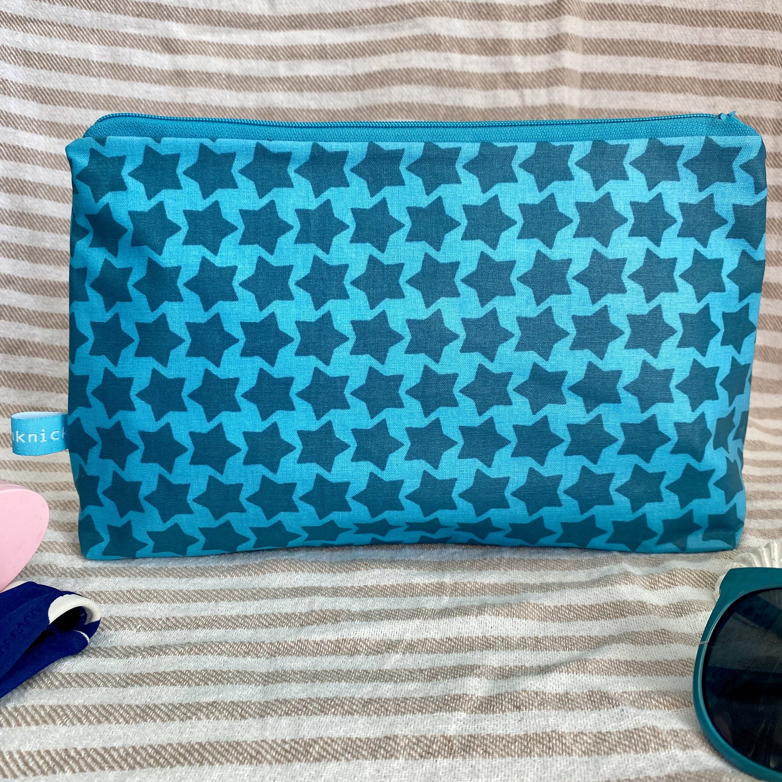 Wetbag, Schwimmtasche, Nasstasche für Strand oder Schwimmbad mit Sternen in türkis