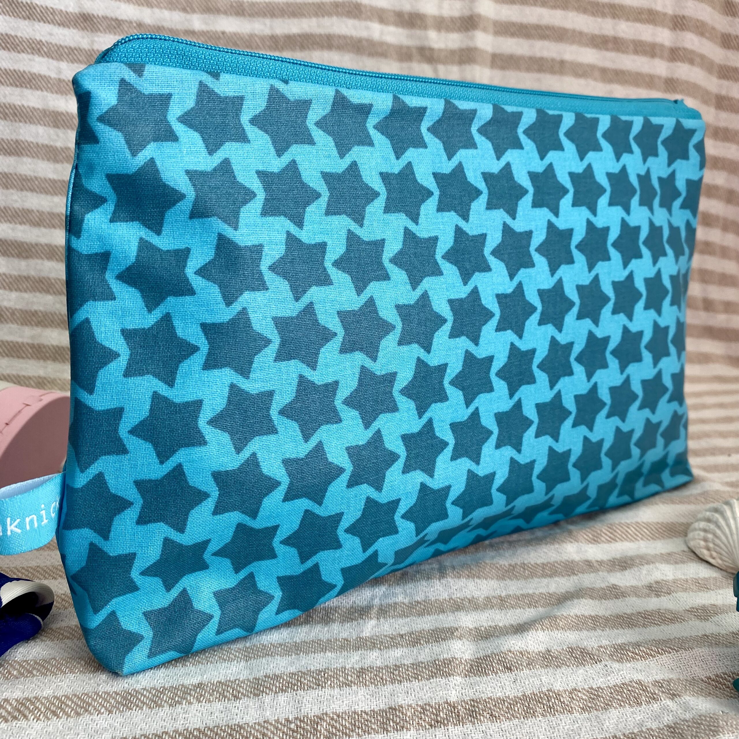 Wetbag, Schwimmtasche, Nasstasche für Strand oder Schwimmbad mit Sternen in türkis