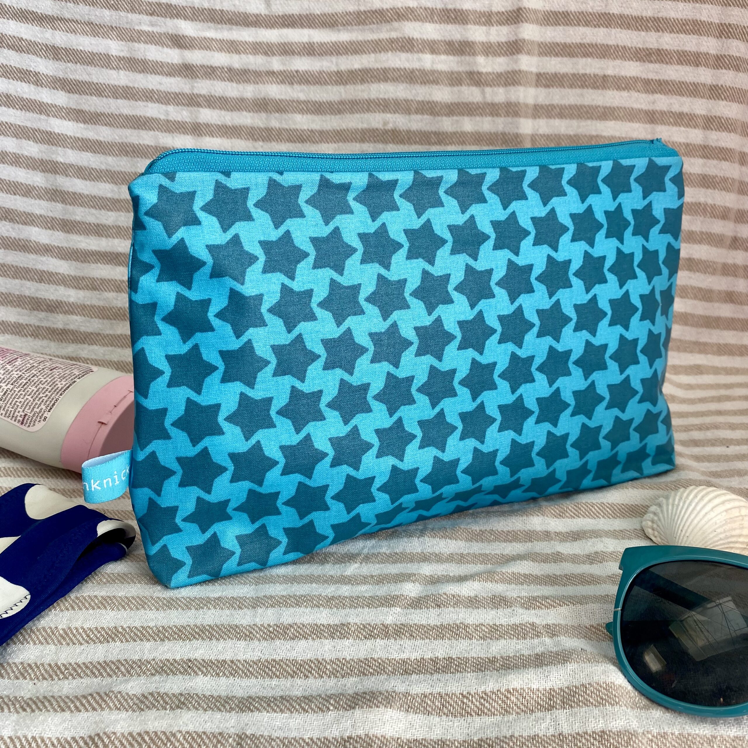 Wetbag, Schwimmtasche, Nasstasche für Strand oder Schwimmbad mit Sternen in türkis